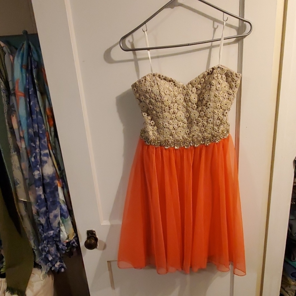 Gold and coral strapless dress